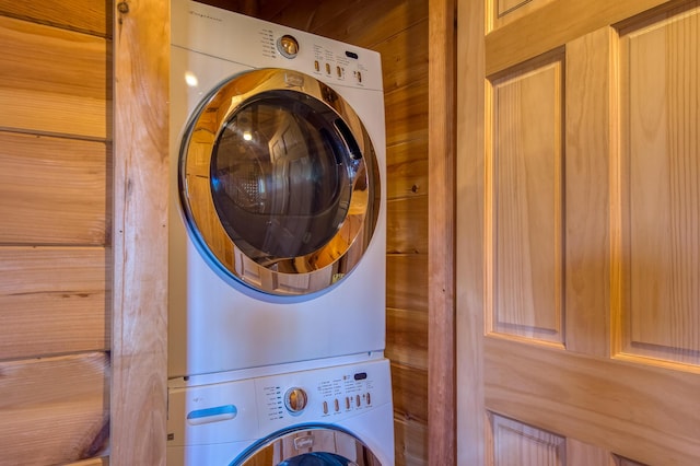 49 Winston Rd, Rangeley, ME 04970 - laundry room featuring estacked washer and dryer