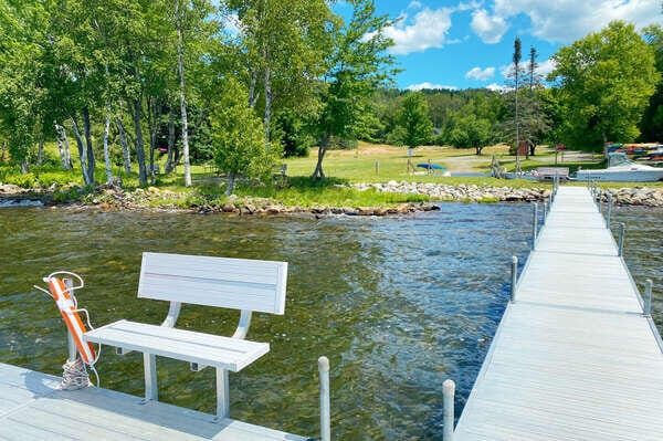 49 Winston Rd, Rangeley, ME 04970 - dock area with a water view and view of wooded area