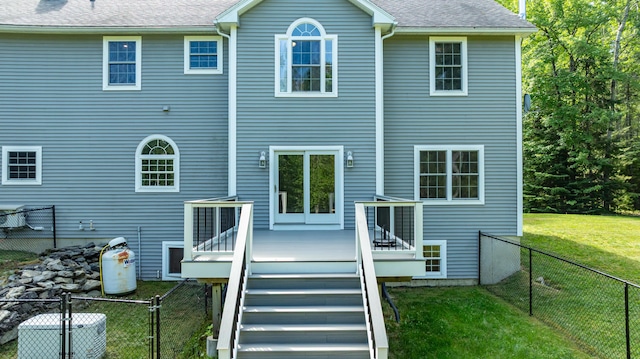 34 Perk Orock Landing Rd, Orono, ME 04473 - rear view of property with a fenced backyard, stairway, a deck, and roof with shingles