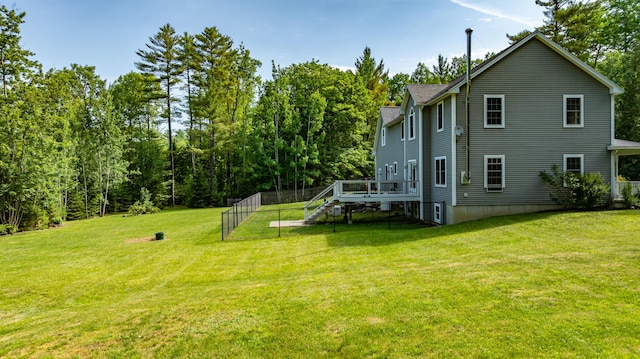 34 Perk Orock Landing Rd, Orono, ME 04473 - back of property featuring stairs, a lawn, and a deck