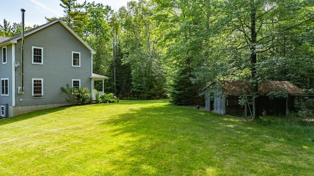 34 Perk Orock Landing Rd, Orono, ME 04473 - view of grassy yard featuring a shed