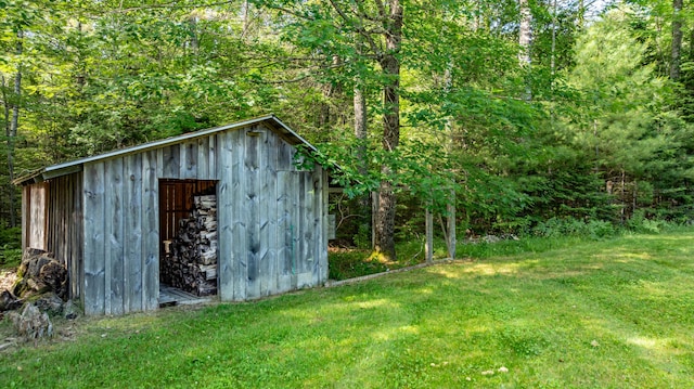 34 Perk Orock Landing Rd, Orono, ME 04473 - view of shed featuring a forest view