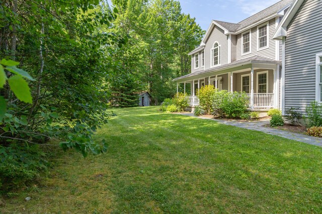 34 Perk Orock Landing Rd, Orono, ME 04473 - view of green lawn featuring a porch