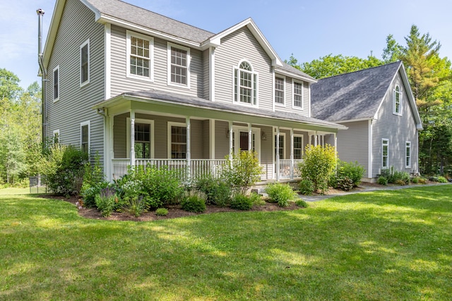 34 Perk Orock Landing Rd, Orono, ME 04473 - view of front of home featuring covered porch, a front lawn, and roof with shingles