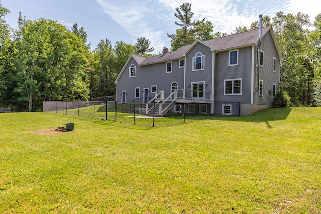 34 Perk Orock Landing Rd, Orono, ME 04473 - back of property with stairs, a chimney, and a deck