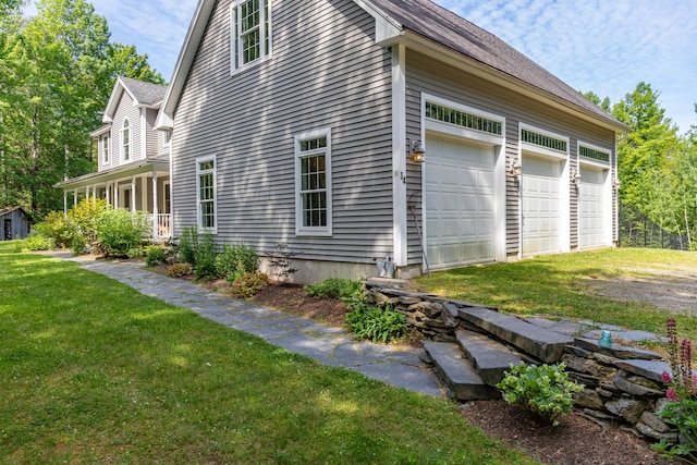 34 Perk Orock Landing Rd, Orono, ME 04473 - view of side of home with a yard and driveway
