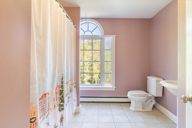 34 Perk Orock Landing Rd, Orono, ME 04473 - full bathroom with baseboard heating, healthy amount of natural light, and tile patterned flooring