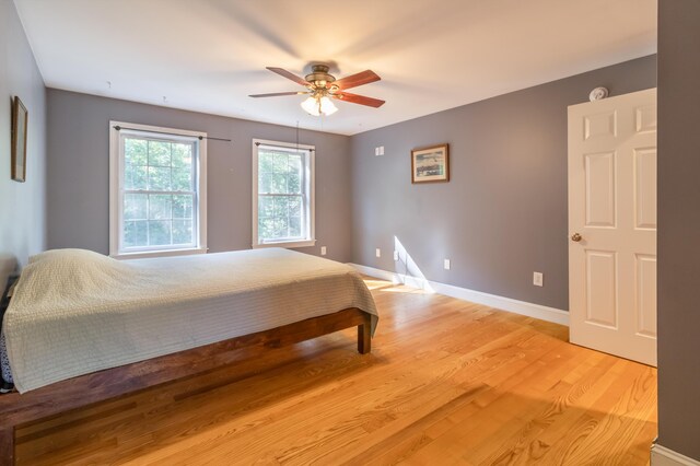 34 Perk Orock Landing Rd, Orono, ME 04473 - bedroom with light wood finished floors and a ceiling fan
