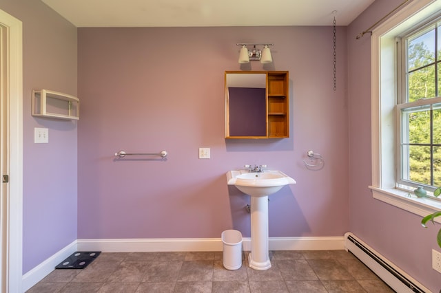 34 Perk Orock Landing Rd, Orono, ME 04473 - bathroom featuring a baseboard radiator and baseboards