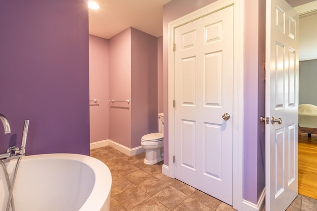 34 Perk Orock Landing Rd, Orono, ME 04473 - full bath with a soaking tub and tile patterned flooring