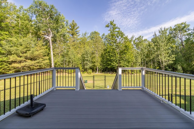 34 Perk Orock Landing Rd, Orono, ME 04473 - deck featuring a lawn and view of wooded area