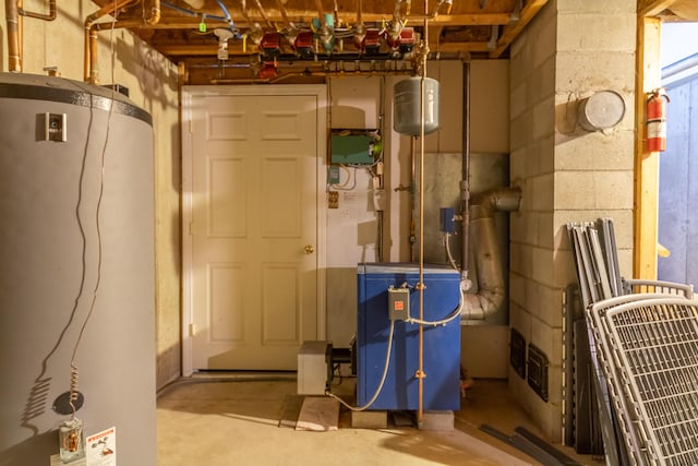 34 Perk Orock Landing Rd, Orono, ME 04473 - utility room with water heater and a heating unit