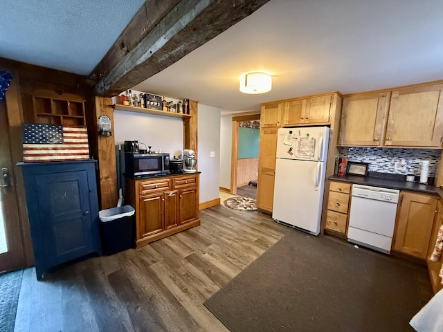 1897 Pequawket Trl, Hiram, ME 04041 - kitchen with white appliances, dark wood finished floors, dark countertops, tasteful backsplash, and open shelves