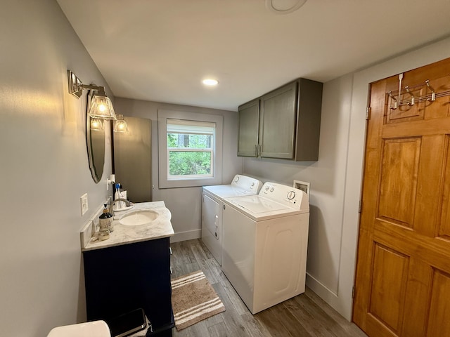 1897 Pequawket Trl, Hiram, ME 04041 - laundry area featuring washing machine and dryer, light wood-style floors, and recessed lighting