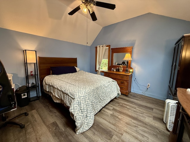 1897 Pequawket Trl, Hiram, ME 04041 - bedroom featuring wood finished floors, lofted ceiling, and a ceiling fan