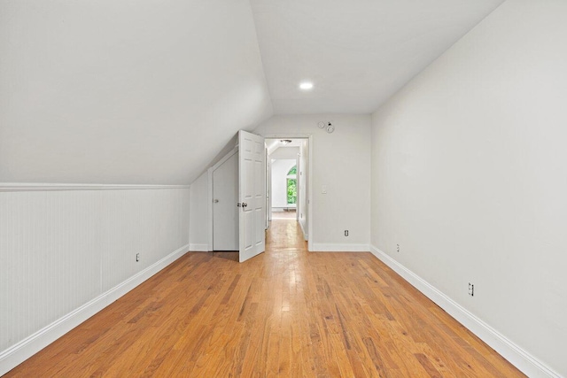 27 Bradford Rd, Wiscasset, ME 04578 - bonus room with lofted ceiling and light wood-style floors