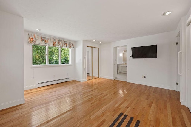 13 Community House Rd, Kennebunkport, ME 04046 - unfurnished bedroom featuring a baseboard radiator, light wood finished floors, recessed lighting, and ensuite bath