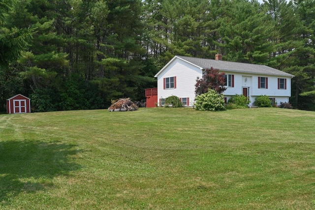 13 Evergreen Dr, Hampden, ME 04444 - view of grassy yard featuring a storage unit