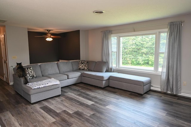 13 Evergreen Dr, Hampden, ME 04444 - living area with dark wood-style flooring and a ceiling fan