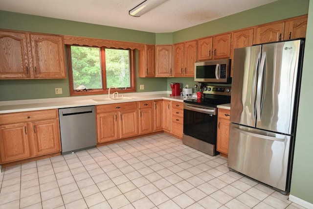 13 Evergreen Dr, Hampden, ME 04444 - kitchen featuring stainless steel appliances and light countertops