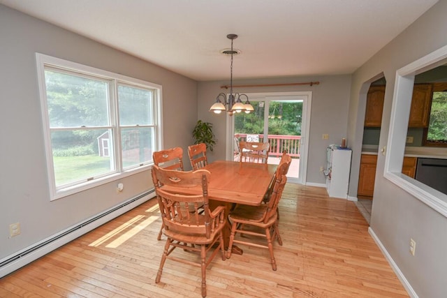 13 Evergreen Dr, Hampden, ME 04444 - dining room featuring baseboard heating, a chandelier, and light wood-style flooring