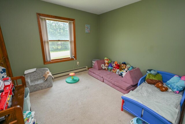 13 Evergreen Dr, Hampden, ME 04444 - bedroom with a baseboard radiator and carpet flooring