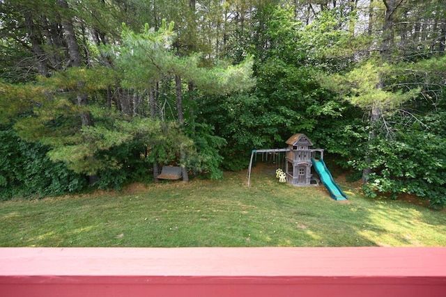 13 Evergreen Dr, Hampden, ME 04444 - view of green lawn featuring a playground