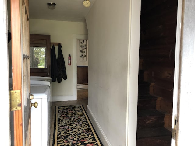 95 Main St, Lubec, ME 04652 - hall with a baseboard radiator and tile patterned floors
