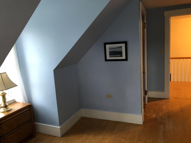 95 Main St, Lubec, ME 04652 - additional living space featuring hardwood / wood-style floors and vaulted ceiling