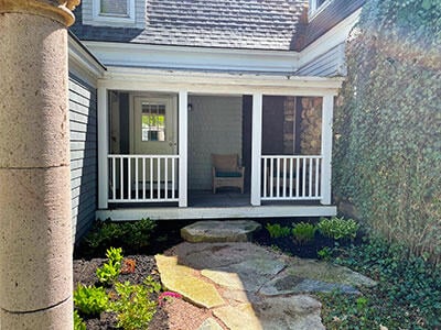 18 Wayman Ln, Bar Harbor, ME 04609 - view of exterior entry with a porch