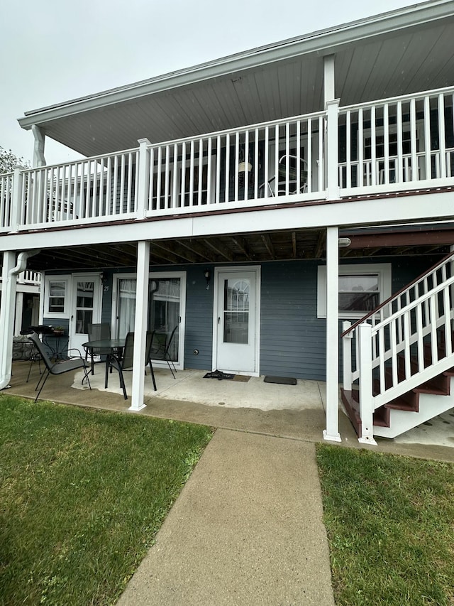 85 Mile Rd Unit 13, Wells, ME 04090 - rear view of house featuring a patio area, a balcony, and stairway