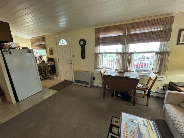 85 Mile Rd Unit 13, Wells, ME 04090 - living area with wood ceiling and a baseboard heating unit
