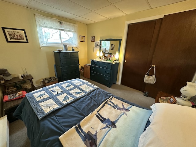 85 Mile Rd Unit 13, Wells, ME 04090 - carpeted bedroom featuring a paneled ceiling