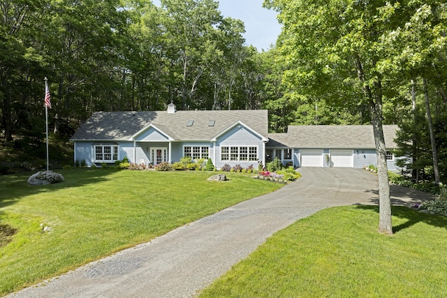 28 Evergreen Dr, Boothbay, ME 04537 - single story home with asphalt driveway, a garage, a front lawn, a chimney, and a shingled roof