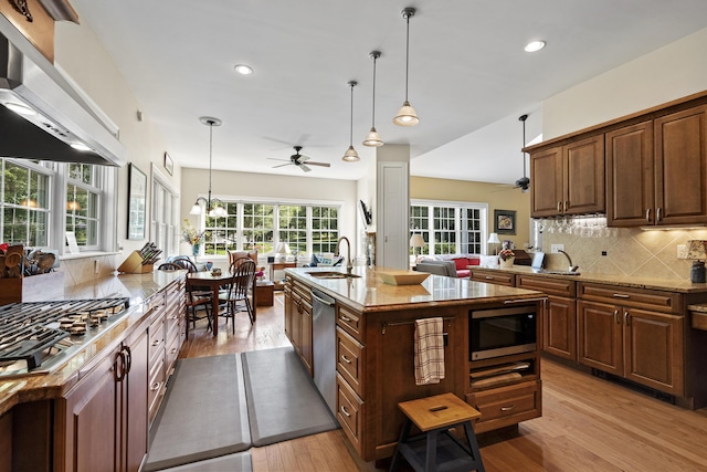 28 Evergreen Dr, Boothbay, ME 04537 - kitchen with ceiling fan, stainless steel appliances, extractor fan, light stone countertops, and recessed lighting