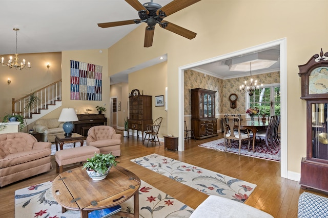 28 Evergreen Dr, Boothbay, ME 04537 - living room featuring a chandelier, wood finished floors, stairway, high vaulted ceiling, and ceiling fan