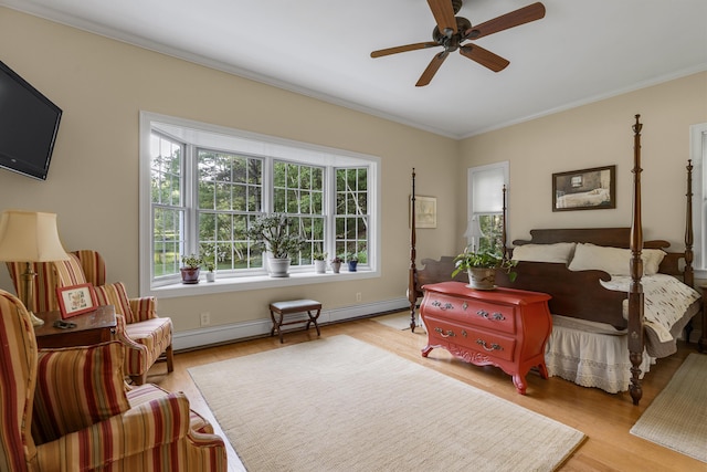 28 Evergreen Dr, Boothbay, ME 04537 - bedroom with ornamental molding, wood finished floors, and a ceiling fan