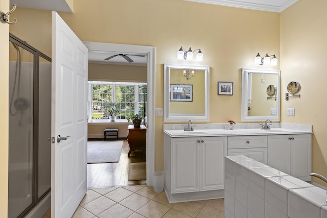 28 Evergreen Dr, Boothbay, ME 04537 - bathroom featuring ornamental molding, double vanity, a shower with shower door, tile patterned flooring, and ceiling fan