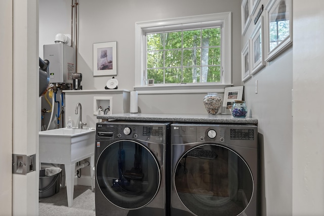 28 Evergreen Dr, Boothbay, ME 04537 - laundry room featuring water heater and washing machine and clothes dryer
