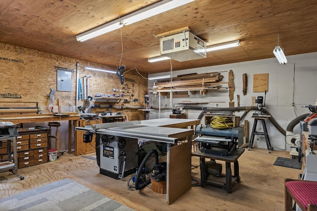 28 Evergreen Dr, Boothbay, ME 04537 - garage with electric panel and a workshop area