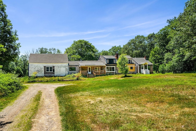 276 W St, Biddeford, ME 04005 - shingle-style home featuring dirt driveway, a front lawn, and covered porch