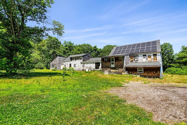 276 W St, Biddeford, ME 04005 - rear view of house featuring solar panels