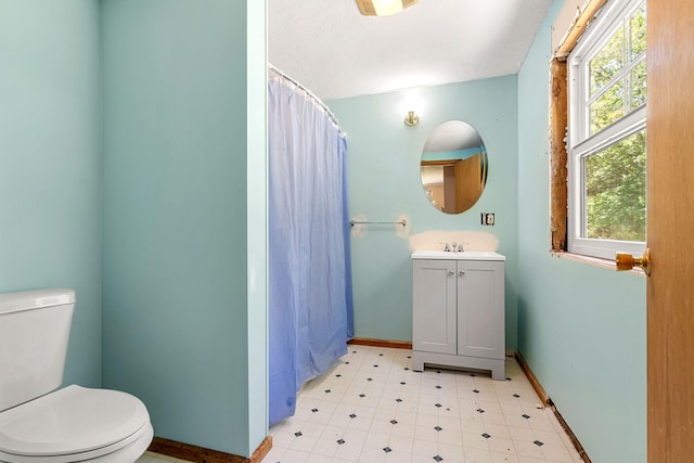 276 W St, Biddeford, ME 04005 - full bathroom featuring vanity, a shower with shower curtain, and tile patterned floors