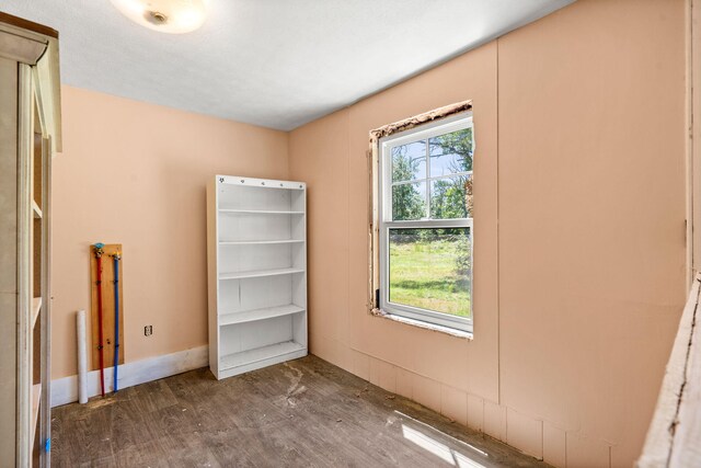 276 W St, Biddeford, ME 04005 - unfurnished room with wood finished floors and baseboards