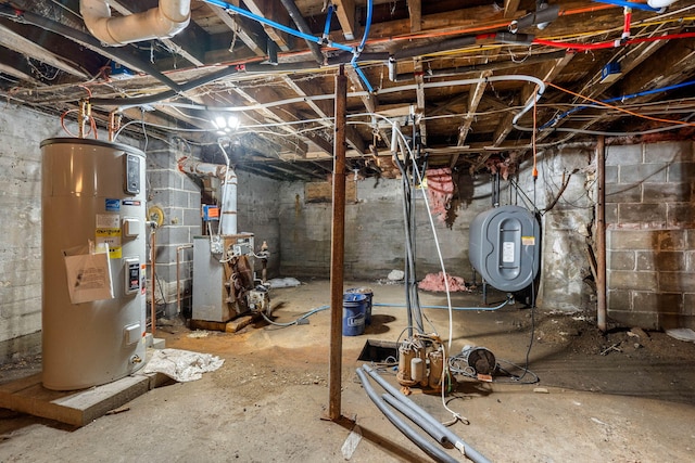 276 W St, Biddeford, ME 04005 - unfinished basement featuring electric water heater, oil tank, and a heating unit