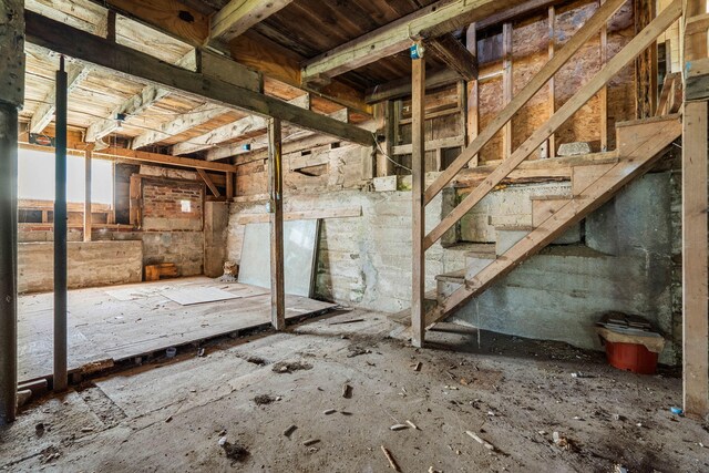 276 W St, Biddeford, ME 04005 - basement featuring stairs