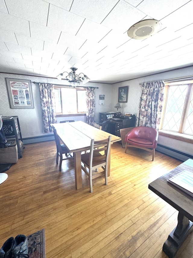 5 Park Ave, Newport, ME 04953 - dining space featuring baseboard heating and hardwood / wood-style flooring
