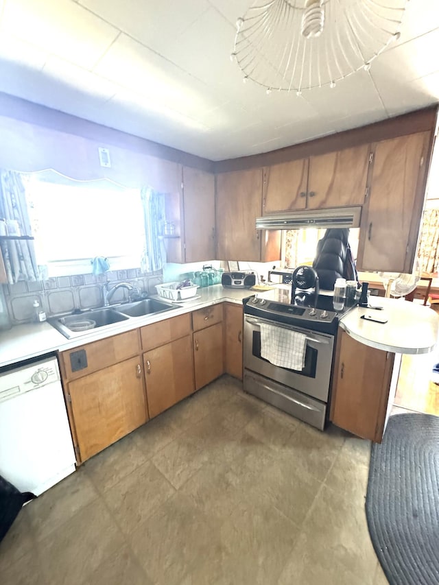 5 Park Ave, Newport, ME 04953 - kitchen with dishwasher, stainless steel electric range oven, light countertops, and under cabinet range hood