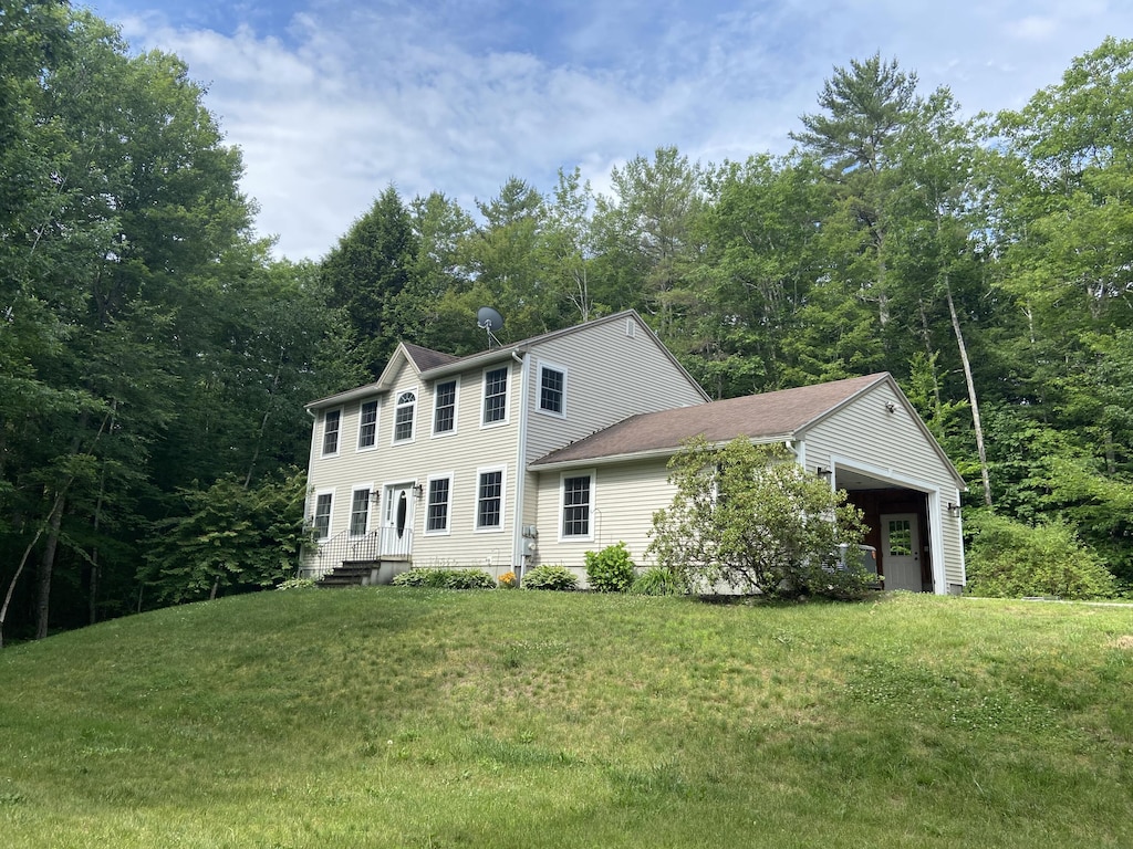 3 Farwell Dr, Raymond, ME 04071 - colonial house featuring a front yard