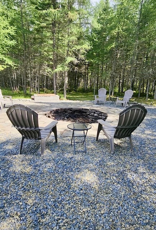 178 Kennebago Rd, Coplin Plt, ME 04970 - view of patio with a fire pit